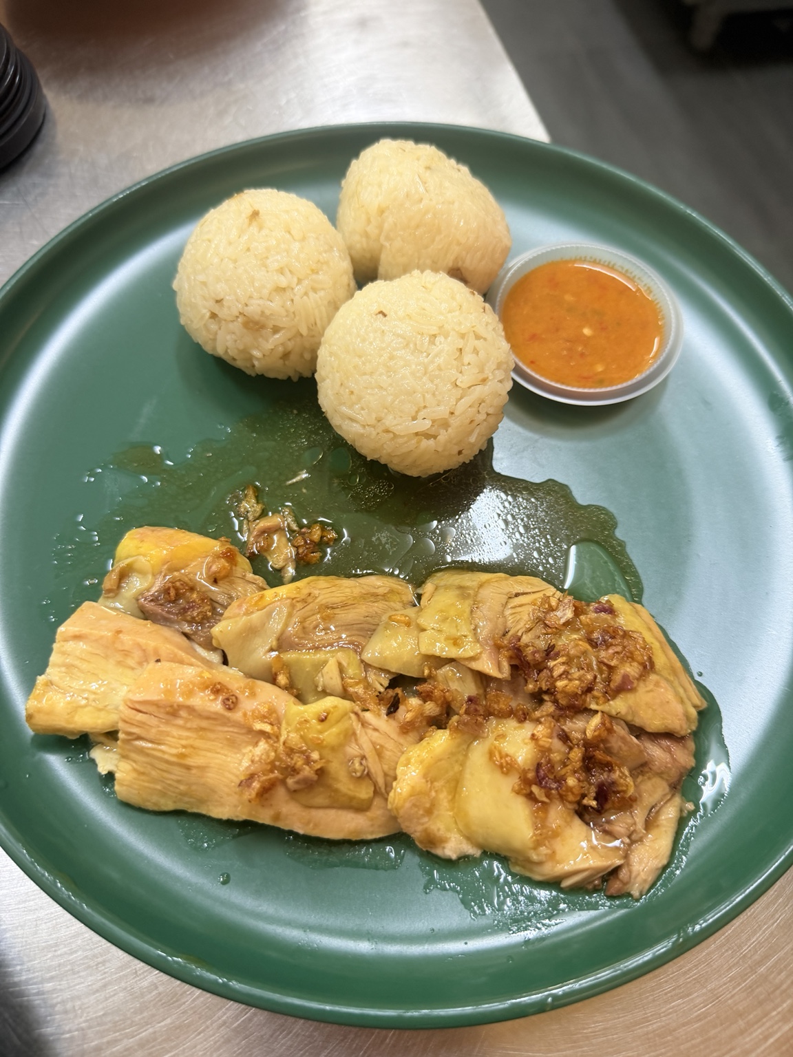 Small Hainanese kampung chicken rice balls with house chilli