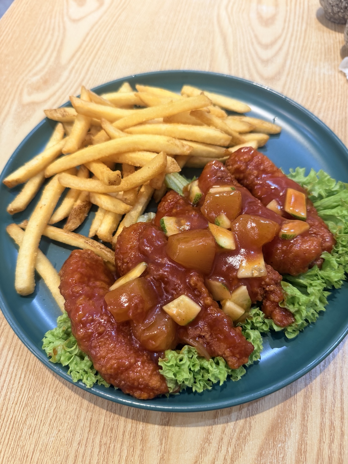 Sweet-and-sour chicken served with fries instead of rice